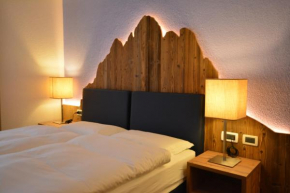 Гостиница Hotel Garnì Nès Crépes  Поцца-Ди-Фасса